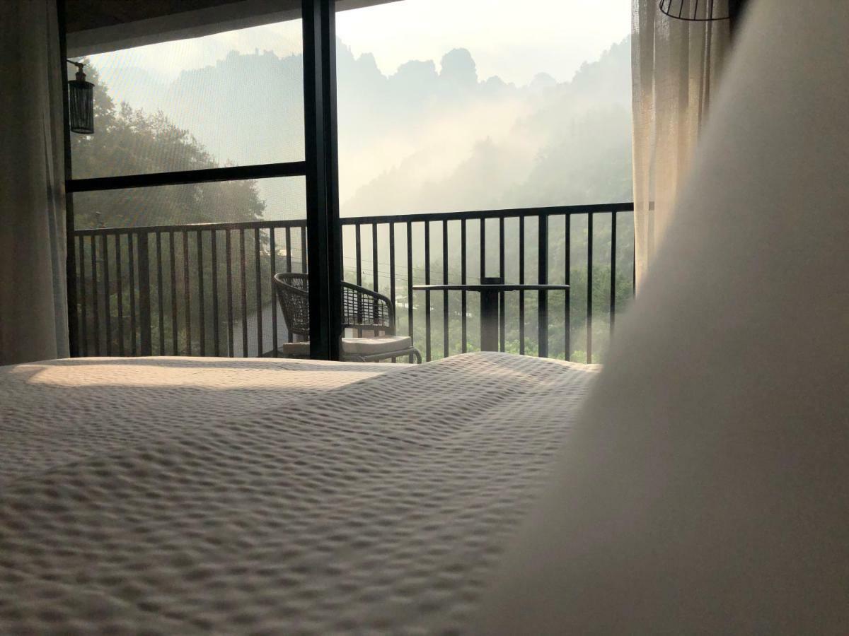 Whispering Mountains Boutique Hotel 張家界市 エクステリア 写真